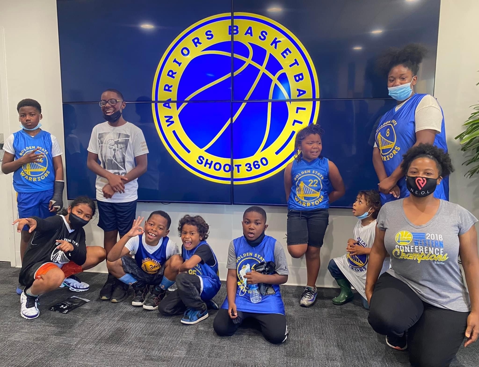 T. Jones with students at Golden State Warriors facilitiy.